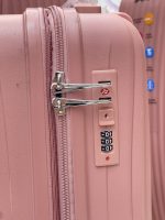 چمدان نشکن اسپید صورتی تیره